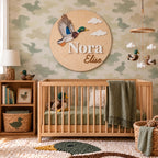Personalized Mallard Duck name sign displayed above a crib in an earthy-toned nursery